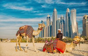 Thrilling desert safari in Dubai with dune bashing, camel rides, and stunning sunset views in the UAE desert, dubai holiday deals